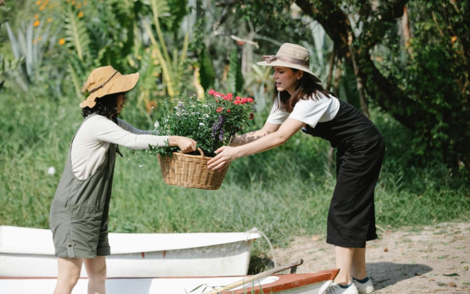 Master florist carefully arranging premium flowers demonstrating our commitment to craftsmanship and attention to detail