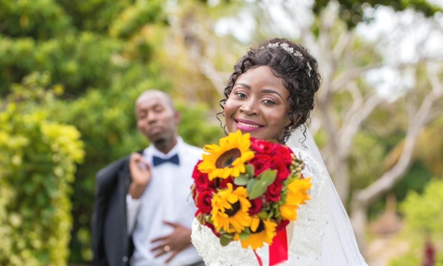 Artisan carefully arranging individual flower stems